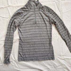 Size Medium Smartwool 100% merino wool baselayer top.